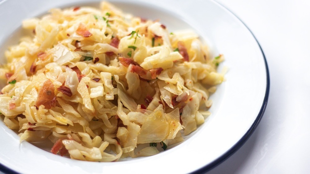 Fried cabbage on white and blue plate