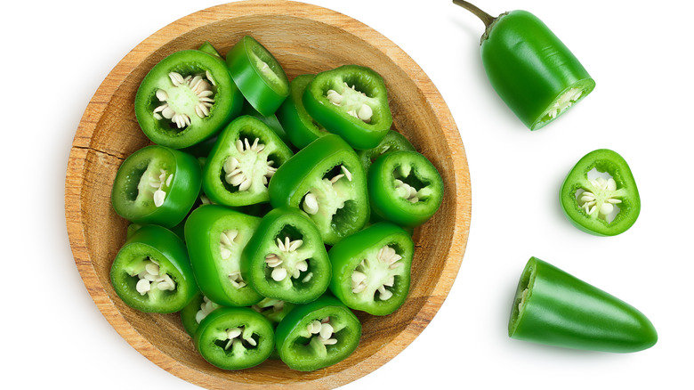 jalapeños in wooden bowl