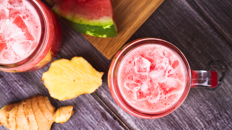 watermelon and ginger root on wood