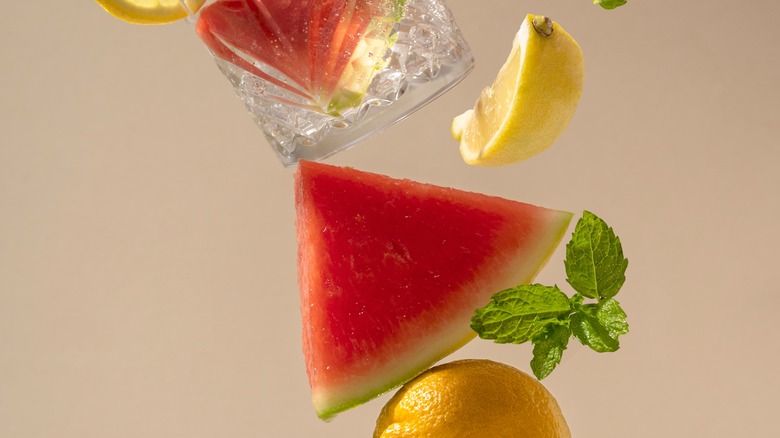 falling watermelon and lemon slices