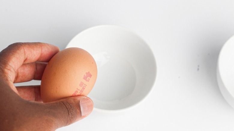 egg into ramekin