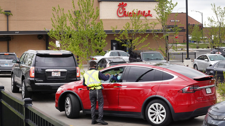 Chick-fil-A employee in drive-thru line