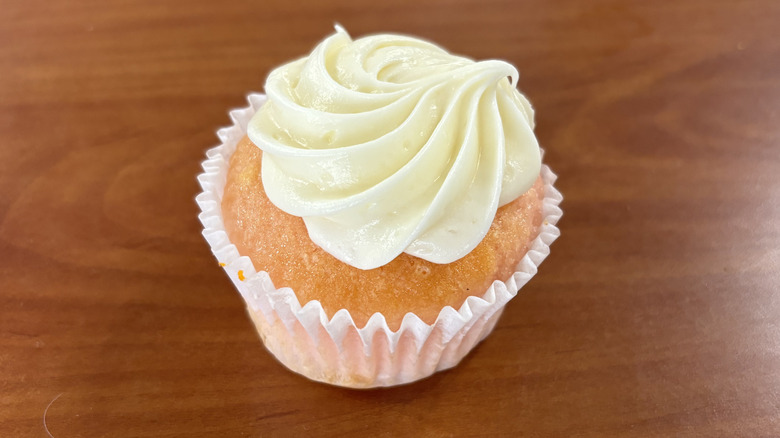 pink cupcake with white frosting