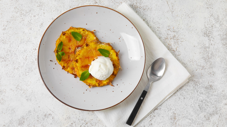 grilled pineapple with cream and herb