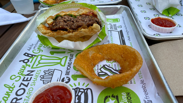 Burger and onion ring from BurgerFi