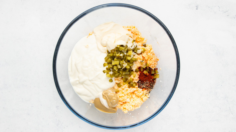 deviled egg dip ingredients in bowl