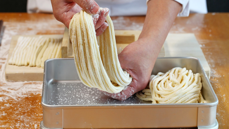 udon noodles chef making