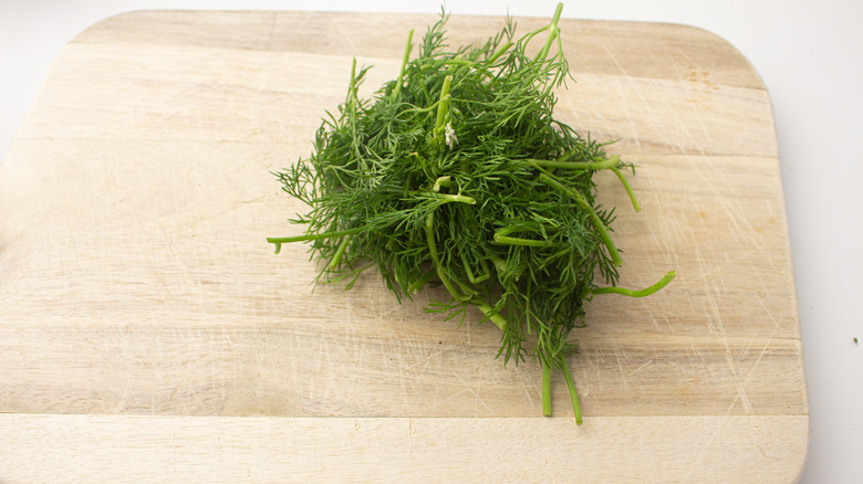 dill on cutting board 