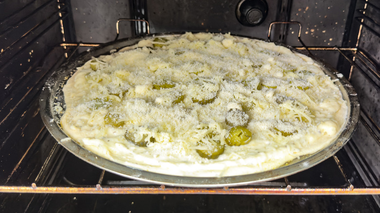 pizza cooking in oven