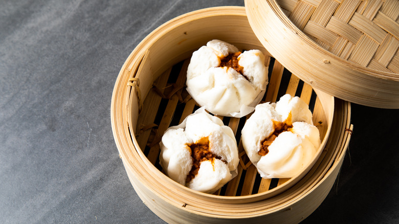 Char siu bao in bamboo steamer 