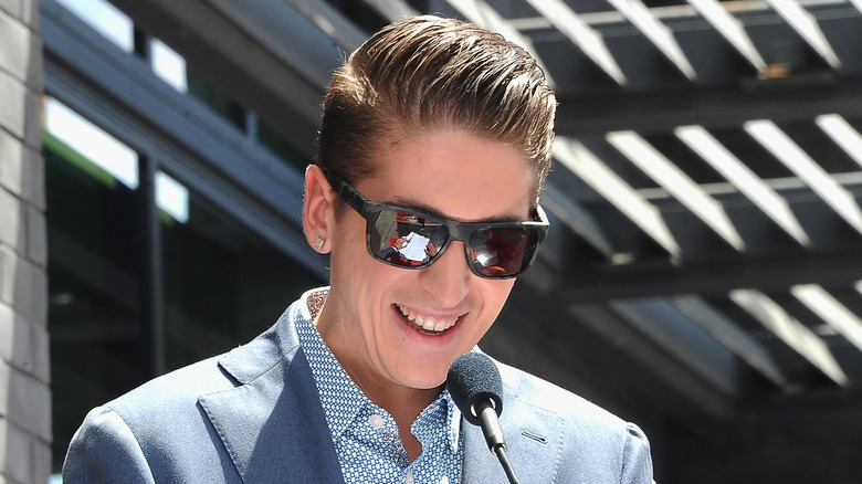 Hunter smiling with sunglasses