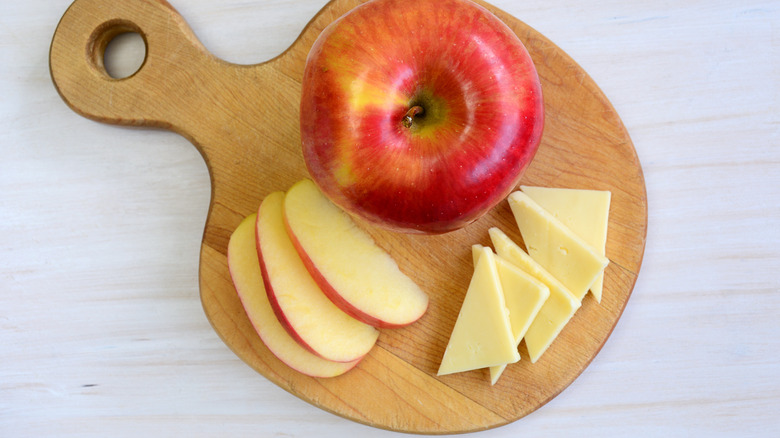 apple and cheese on board