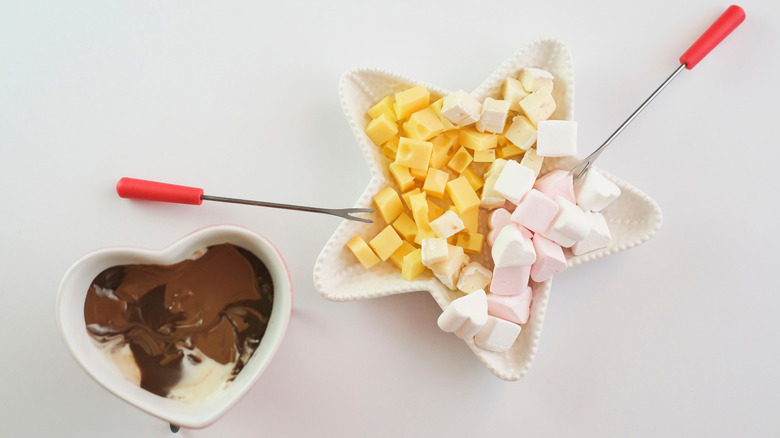 Chocolate fondue cheese and marshmallows