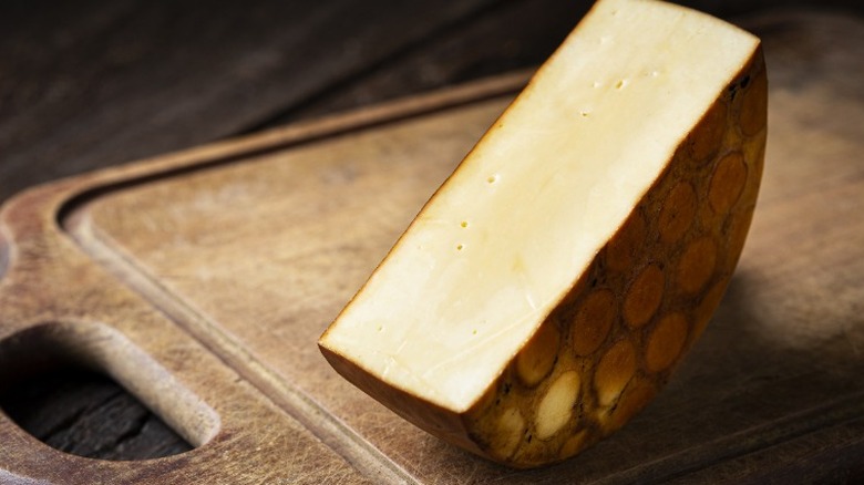 Smoked cheese on a cutting board