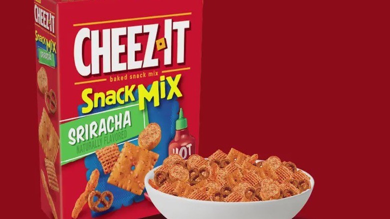 Box of Cheez-It Sriracha Snack Mix next to a bowl of snack mix