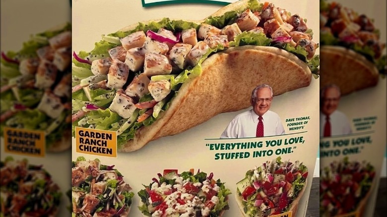 Standing advertisement for fresh stuffed pitas