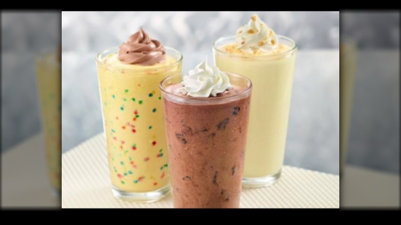 Assortment of milkshakes in glasses