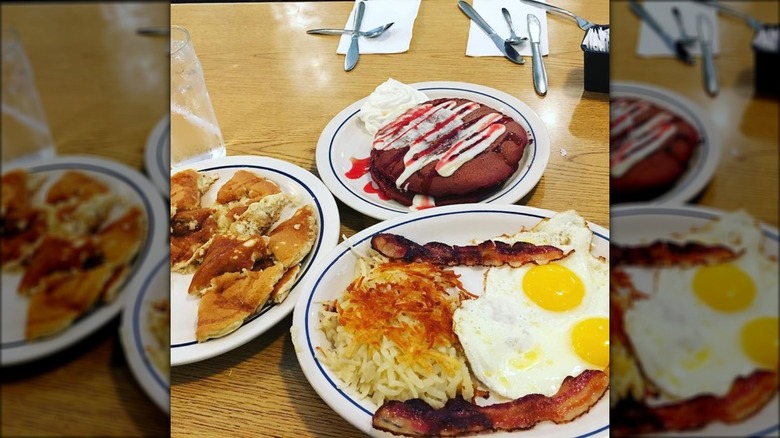 Eggs, bacon, hash browns, red velvet pancakes