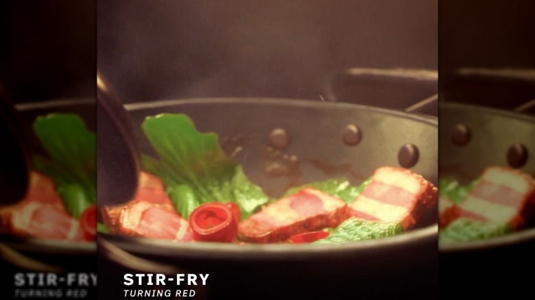 wok of pork and lettuce stir fry from "Turning Red"