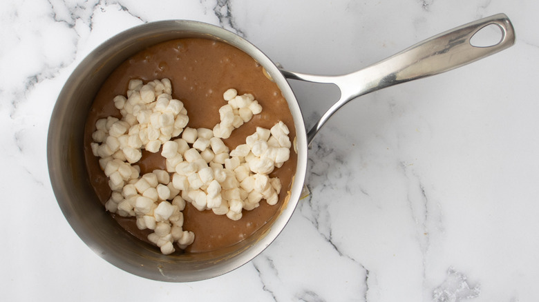 marshmallows in peanut mixture