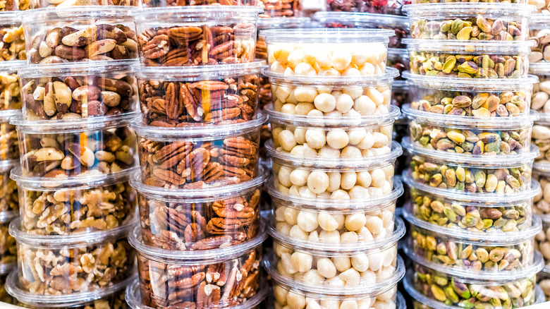 Assorted nuts in stacked containers