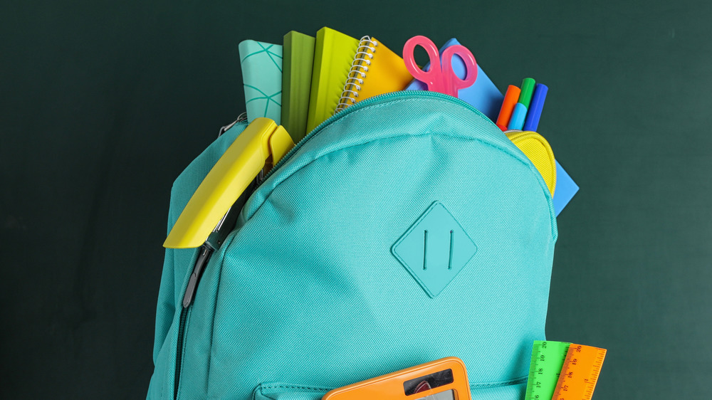 Backpack stuffed with school supplies