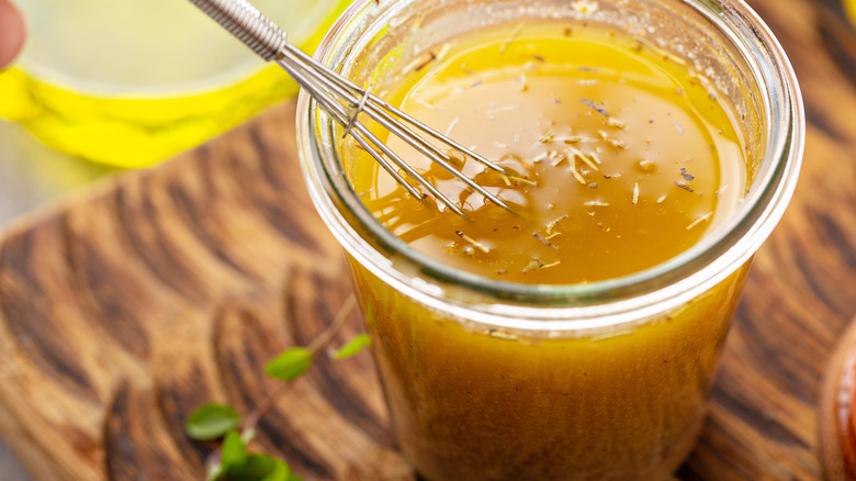 Oil-based marinade or dressing in a jar