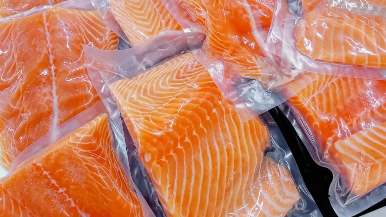 individual salmon wrapped in plastic