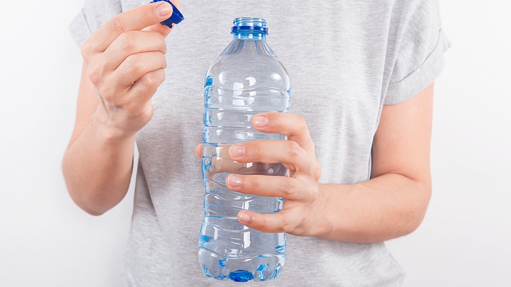 Should I be concerned if disposable water bottles freeze or overheat?
