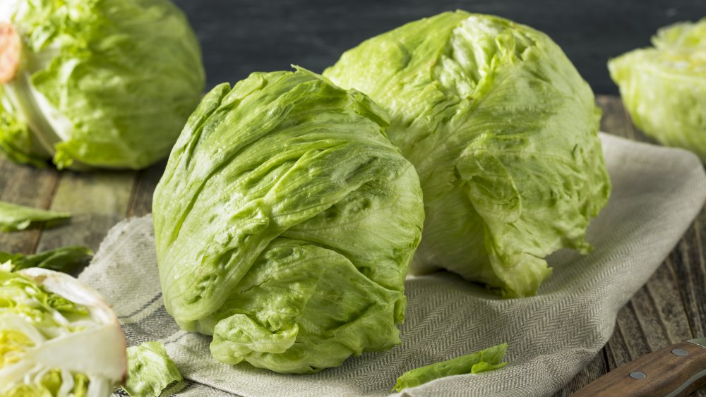 two heads of iceberg lettuce