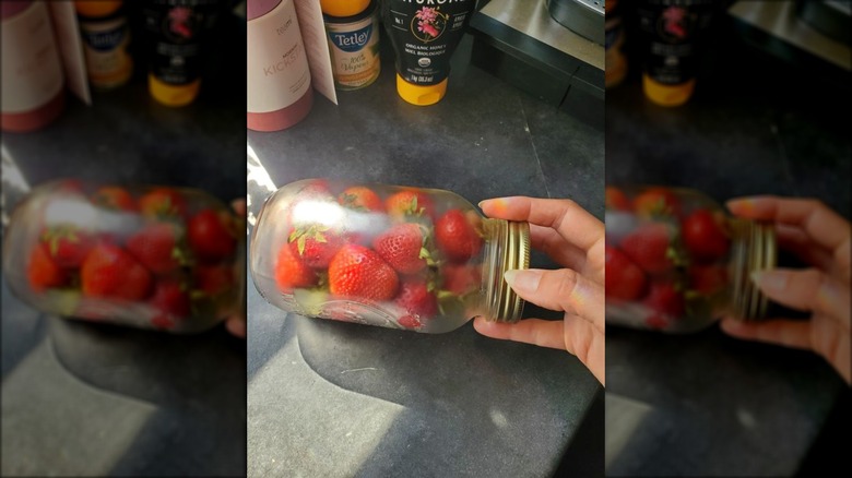 mason jar filled with strawberries