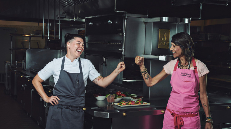 Dominique Crenn fist bumping chef