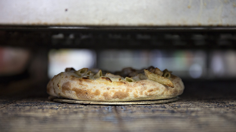 Domino's bread bowl in oven