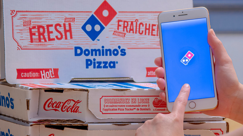 Domino's Pizza boxes and cell phone