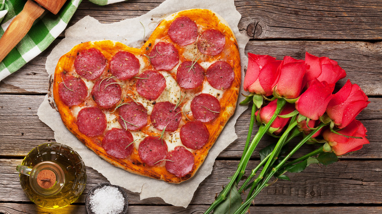 heart-shaped pizza with roses