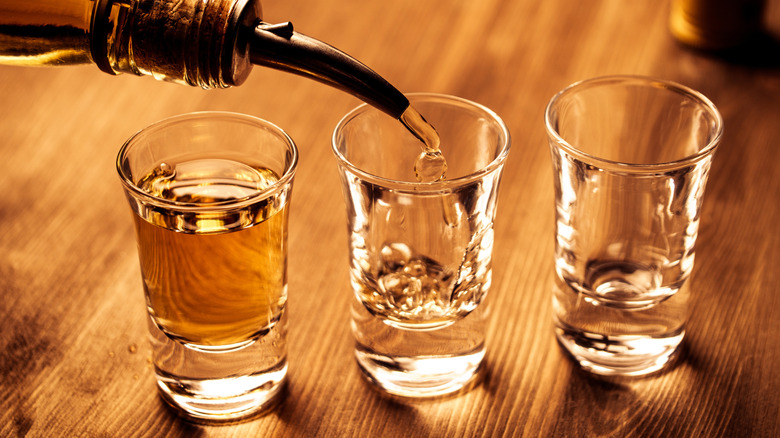 Liquor poured in shot glasses