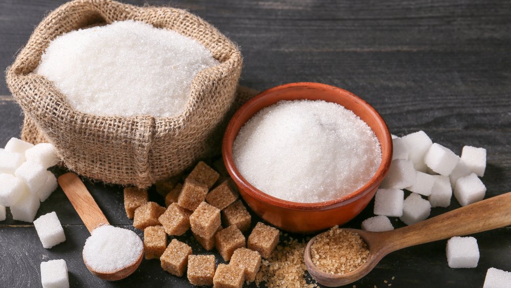 Brown sugar and white sugar on a table