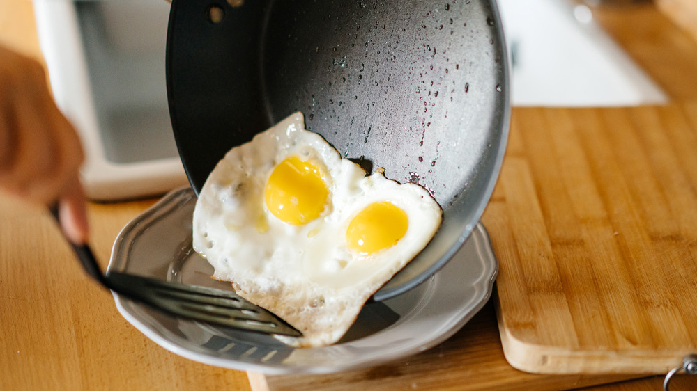 Eggs cooking in pan