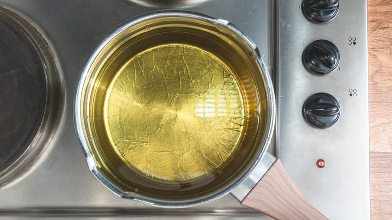 hot oil in pot on stove