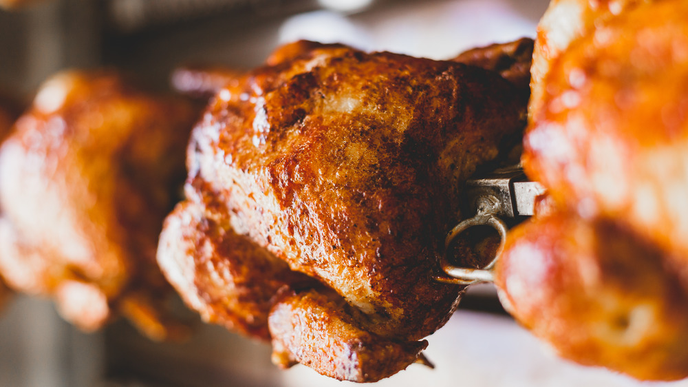 Rotisserie chicken cooking