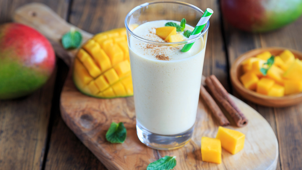 mango lassi with cinnamon and mint