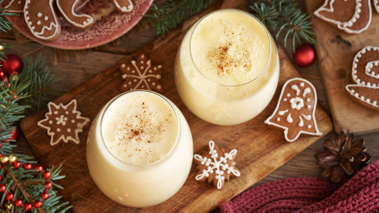 festive eggnog cookies and two glasses of eggnog