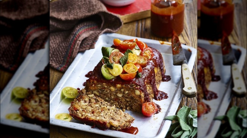 Meatloaf topped with tomatoes