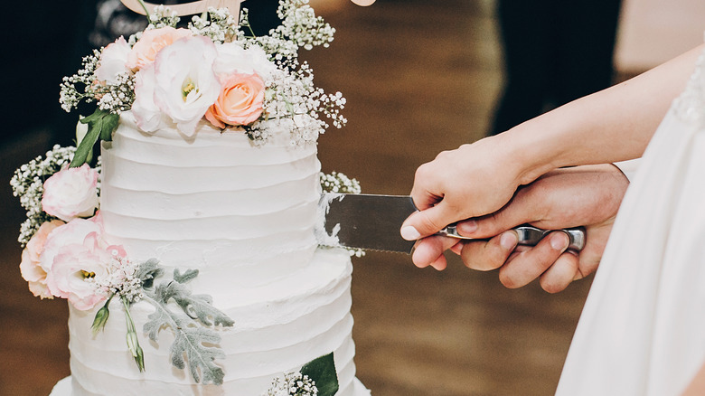 Cutting wedding cake