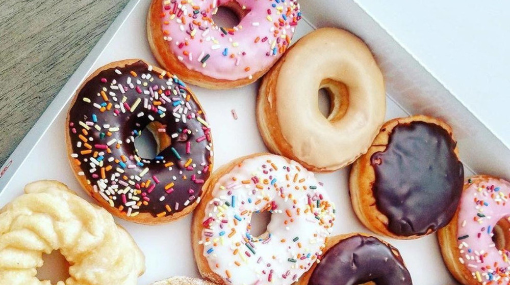 Colorful donuts in box