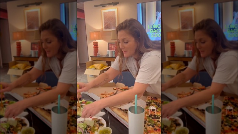 Drew Barrymore making pizza salad