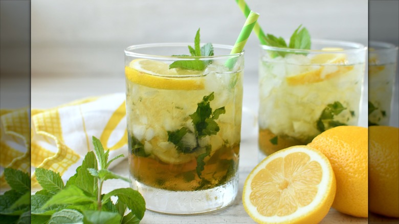 cocktails with ice and fresh herbs