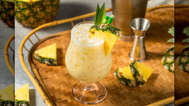 tropical cocktail with pineapple garnish