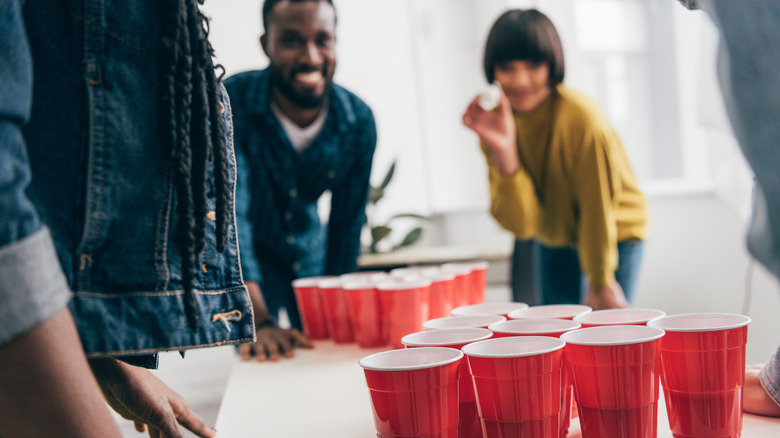 People playing beer pong