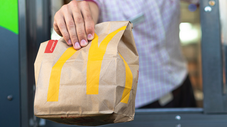 McDonald's bag handed to customer